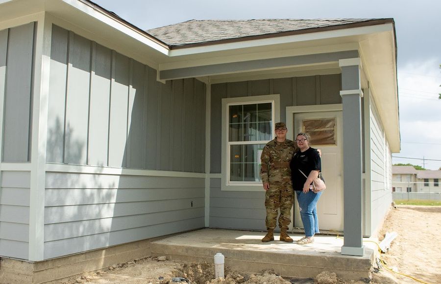 Air National Guard family in front of their home